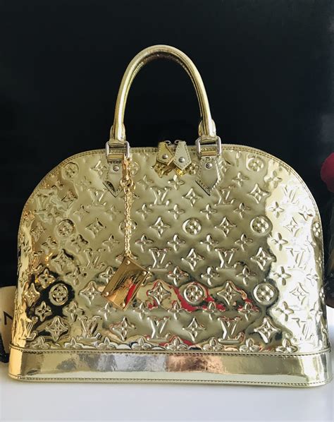 gold lv bag|louis vuitton gold purse.